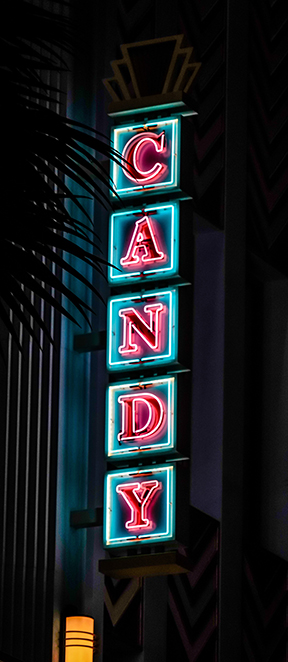 Neon sign that reads "Candy."